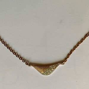 Sarah Coventry “Twilight” ribbed gold-tone pendant necklace. Designed in Canada